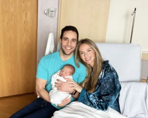Kelly Ann Cicalese, along with her husband and her first son. 